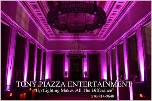 Purple uplighting at elegant event venue ballroom